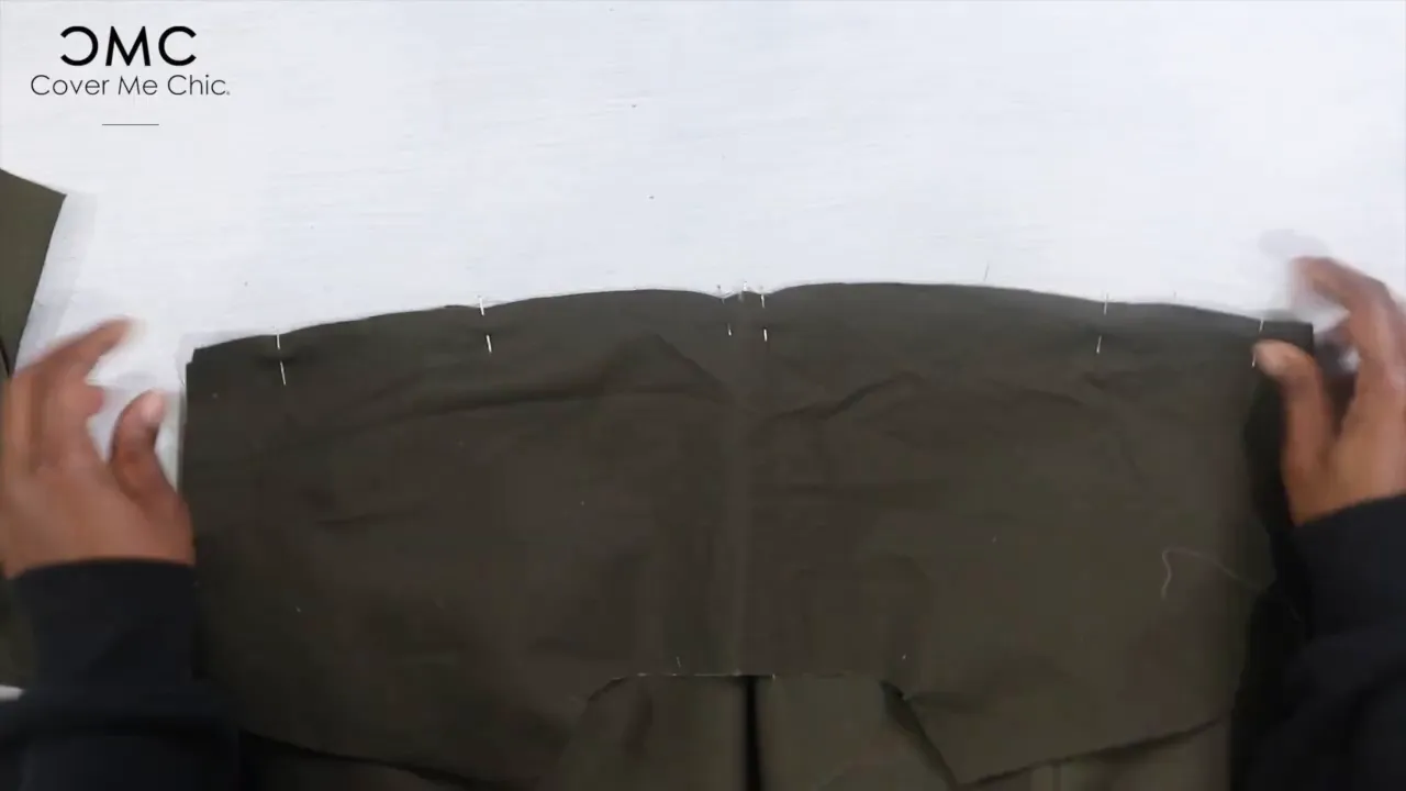 Sandwiching the back yolk and bodice for sewing the shoulder seam