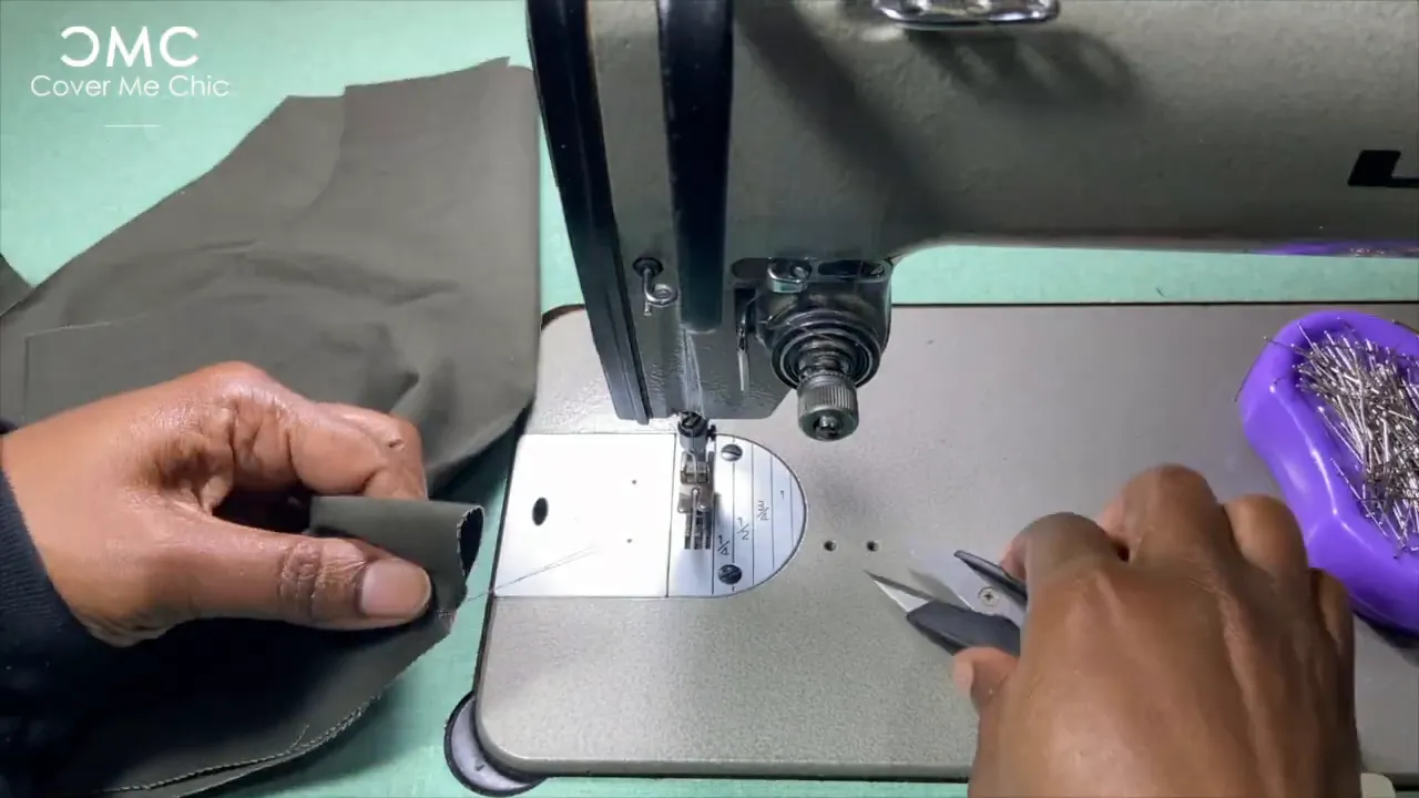 Sewing darts carefully from the tip to the base for a smooth finish