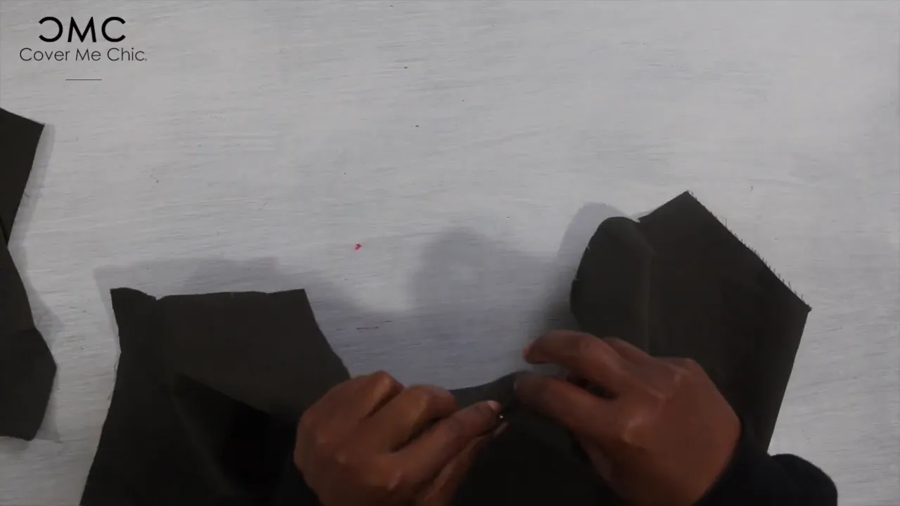 Forming and pinning the back pleat on the dress pattern pieces