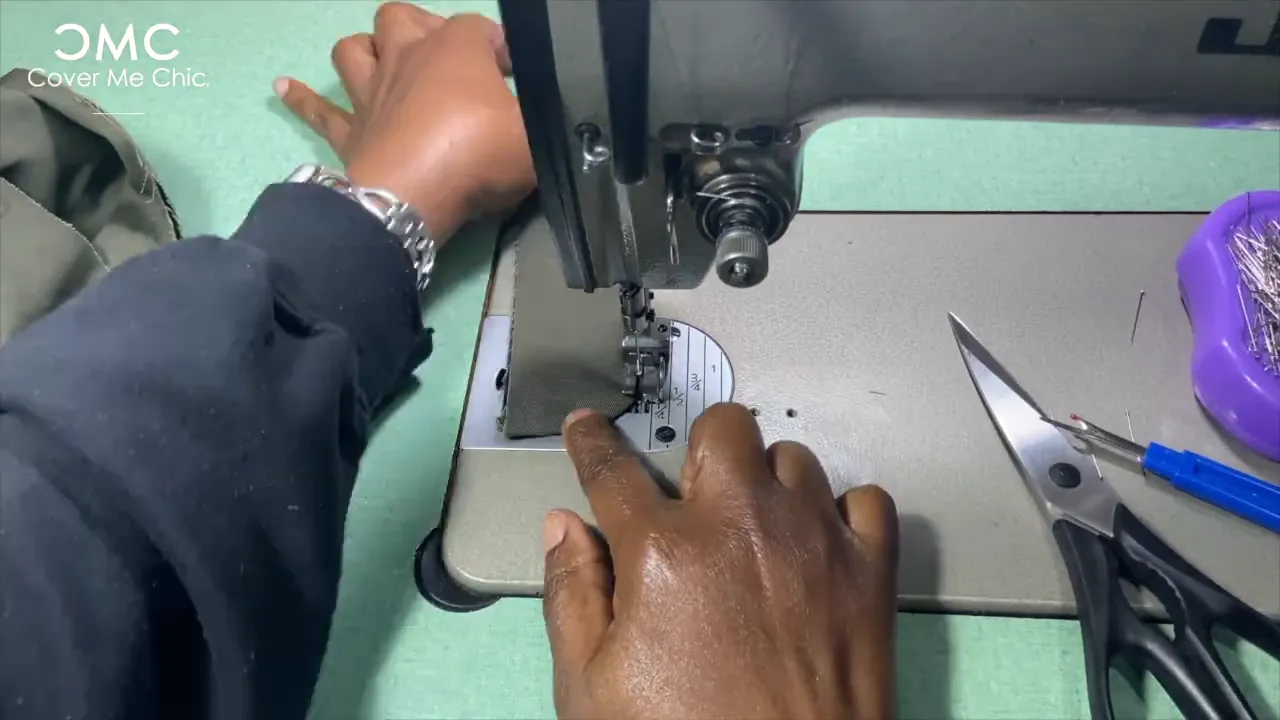 Sewing the collar to the bodice with notches aligned and stay stitching